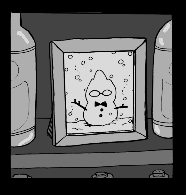 Framed photo of a Grillby-shaped snowman sitting on a shelf